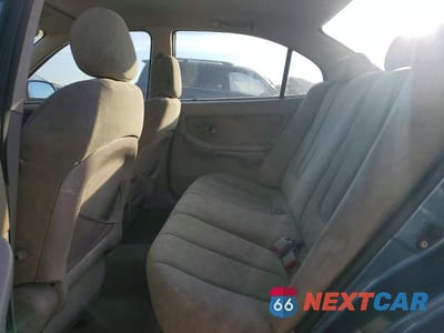 Zdjęcie 10 z 13 samochodu: 2003 HYUNDAI ELANTRA GLS VIN:KMHDN45D53U615576 - miniatura