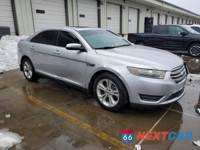 Czwarte zdjęcie samochodu z boku: 2017 FORD TAURUS SEL VIN:1FAHP2E84HG125374 - miniatura