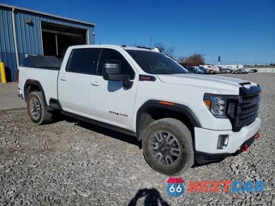 Czwarte zdjęcie samochodu z boku: 2023 GMC SIERRA K2500 AT4 VIN:1GT49PEYXPF212717 - miniatura