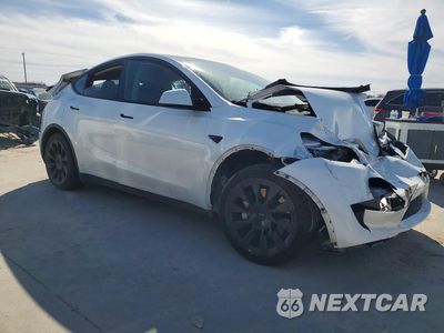 Czwarte zdjęcie samochodu z boku: 2023 TESLA MODEL Y VIN:7SAYGDEE2PA041199 - miniatura