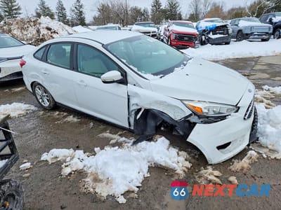 Czwarte zdjęcie samochodu z boku: 2016 FORD FOCUS SE VIN:1FADP3F20GL265779 - miniatura