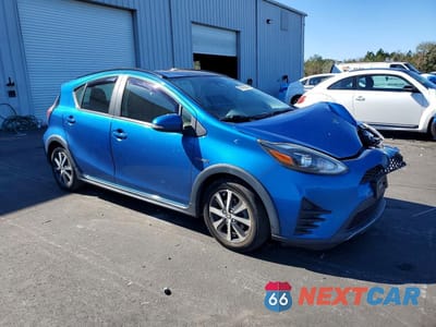 Czwarte zdjęcie samochodu z boku: 2018 TOYOTA PRIUS C TWO VIN:JTDKDTB33J1619581 - miniatura