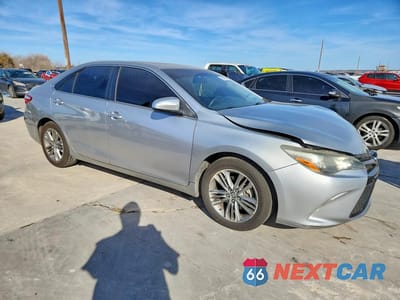 Czwarte zdjęcie samochodu z boku: 2015 TOYOTA CAMRY HYBRID VIN:4T1BD1FK7FU146081 - miniatura
