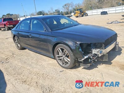 Czwarte zdjęcie samochodu z boku: 2017 AUDI A8 L QUATTRO VIN:WAU44AFD4HN008975 - miniatura