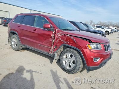 Czwarte zdjęcie samochodu z boku: 2014 JEEP GRAND CHEROKEE LAREDO VIN:1C4RJFAGXEC239225 - miniatura