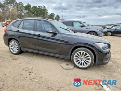 Czwarte zdjęcie samochodu z boku: 2014 BMW X1 SDRIVE28I VIN:WBAVM1C5XEVW50419 - miniatura