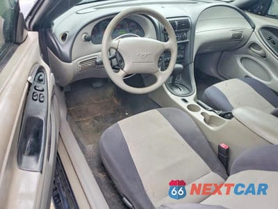 Zdjęcie 8 z 11 samochodu: 2003 FORD MUSTANG VIN:1FAFP404X3F352770 - miniatura