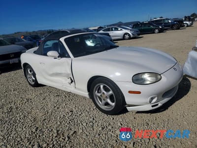 Czwarte zdjęcie samochodu z boku: 1999 MAZDA MX-5 MIATA VIN:JM1NB3530X0113851 - miniatura