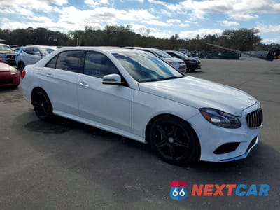 Czwarte zdjęcie samochodu z boku: 2014 MERCEDES-BENZ E 350 VIN:WDDHF5KB5EB017066 - miniatura