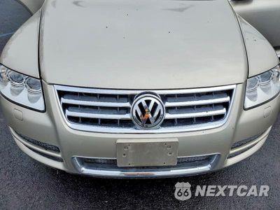 Zdjęcie 11 z 12 samochodu: 2004 VOLKSWAGEN TOUAREG TDI 5.0 VIN:WVGHH77L84D082350 - miniatura