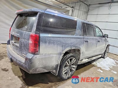 Trzecie zdjęcie samochodu z tyłu: 2019 CHEVROLET SUBURBAN K1500 LT VIN:1GNSKHKC2KR360806 - miniatura