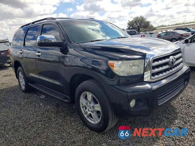 Czwarte zdjęcie samochodu z boku: 2011 TOYOTA SEQUOIA PLATINUM VIN:5TDYY5G1XBS032560 - miniatura