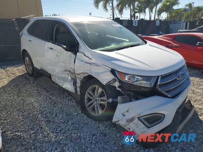 Czwarte zdjęcie samochodu z boku: 2017 FORD EDGE SEL VIN:2FMPK3J99HBC41083 - miniatura