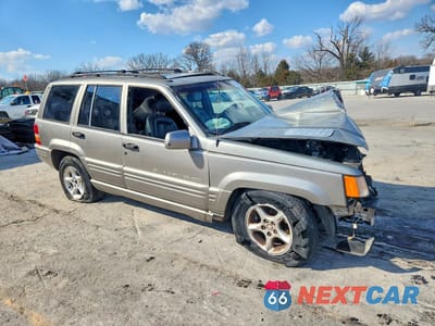 Czwarte zdjęcie samochodu z boku: 1998 JEEP GRAND CHEROKEE LIMITED 5.9L VIN:1J4GZ88Z0WC119450 - miniatura
