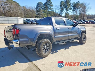 Trzecie zdjęcie samochodu z tyłu: 2023 TOYOTA TACOMA DOUBLE CAB VIN:3TYCZ5AN3PT140176 - miniatura