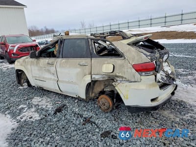 Drugie zdjęcie samochodu z przodu: 2014 JEEP GRAND CHEROKEE SUMMIT VIN:1C4RJFJM2EC342631 - miniatura