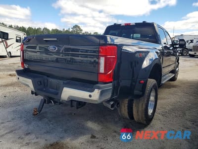 Czwarte zdjęcie samochodu z boku: 2022 FORD F350 SUPER DUTY VIN:1FT8W3DTXNED68803 - miniatura