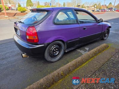 Czwarte zdjęcie samochodu z boku: 1999 HONDA CIVIC DX VIN:2HGEJ6448XH107081 - miniatura