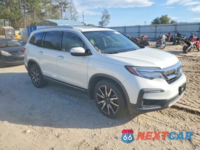 Czwarte zdjęcie samochodu z boku: 2020 HONDA PILOT TOURING VIN:5FNYF6H66LB017713 - miniatura