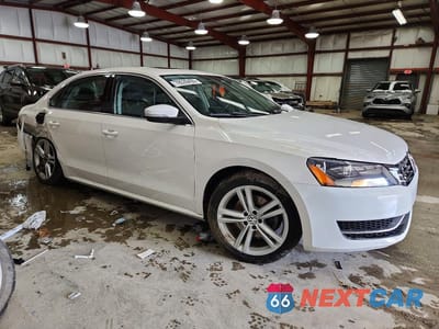 Czwarte zdjęcie samochodu z boku: 2015 VOLKSWAGEN PASSAT SE VIN:1VWBV7A38FC021128 - miniatura