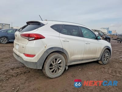 Trzecie zdjęcie samochodu z tyłu: 2017 HYUNDAI TUCSON SE VIN:KM8J3CA46HU430906 - miniatura