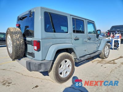 Trzecie zdjęcie samochodu z tyłu: 2014 JEEP WRANGLER UNLIMITED SAHARA VIN:1C4BJWEG0EL196980 - miniatura