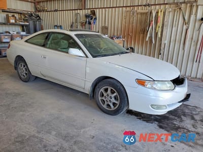 Czwarte zdjęcie samochodu z boku: 2002 TOYOTA CAMRY SOLARA SE VIN:2T1CE22P72C009016 - miniatura