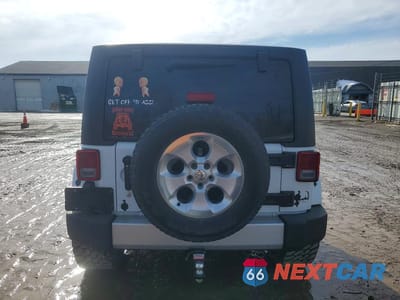 Zdjęcie 6 z 12 samochodu: 2014 JEEP WRANGLER UNLIMITED SAHARA VIN:1C4HJWEGXEL262428 - miniatura