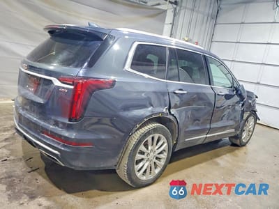 Trzecie zdjęcie samochodu z tyłu: 2022 CADILLAC XT6 PREMIUM LUXURY VIN:1GYKPDRS1NZ153211 - miniatura