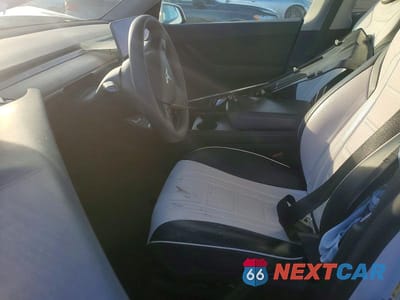 Zdjęcie 7 z 13 samochodu: 2022 TESLA MODEL Y VIN:7SAYGDEE3NF461716 - miniatura
