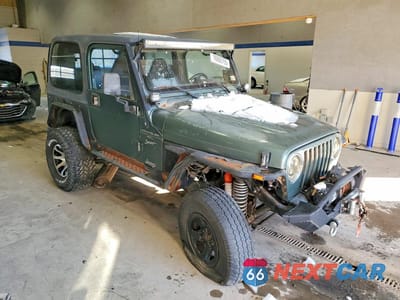Czwarte zdjęcie samochodu z boku: 2000 JEEP WRANGLER / TJ SPORT VIN:1J4FA49S2YP710100 - miniatura