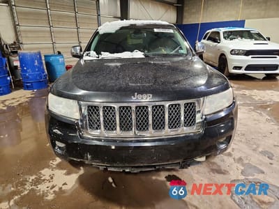 Piąte zdjęcie samochodu w środku: 2013 JEEP GRAND CHEROKEE OVERLAND VIN:1C4RJFCT9DC600193 - miniatura