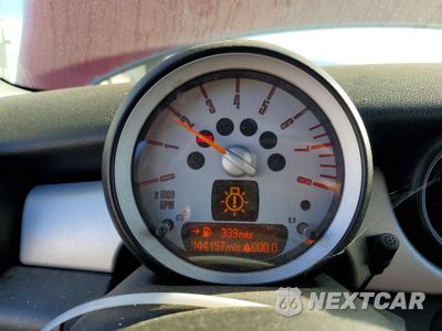 Zdjęcie 9 z 12 samochodu: 2009 MINI COOPER VIN:WMWMF33549TU70792 - miniatura