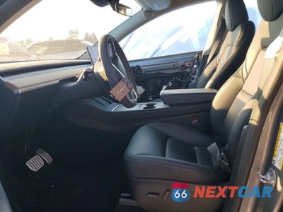 Zdjęcie 7 z 12 samochodu: 2024 TESLA MODEL Y VIN:7SAYGDEF9RA312805 - miniatura