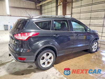 Trzecie zdjęcie samochodu z tyłu: 2013 FORD ESCAPE SE VIN:1FMCU9G97DUD43876 - miniatura