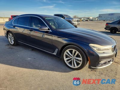 Czwarte zdjęcie samochodu z boku: 2016 BMW 750 I VIN:WBA7F0C51GGL99651 - miniatura