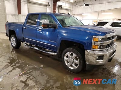 Czwarte zdjęcie samochodu z boku: 2017 CHEVROLET SILVERADO K2500 HEAVY DUTY LTZ VIN:1GC1KWEG1HF132636 - miniatura