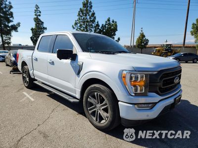 Czwarte zdjęcie samochodu z boku: 2022 FORD F150 SUPERCREW VIN:1FTFW1C86NKD02548 - miniatura