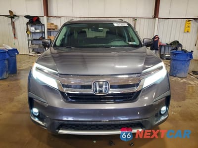Piąte zdjęcie samochodu w środku: 2020 HONDA PILOT TOURING VIN:5FNYF6H95LB005126 - miniatura