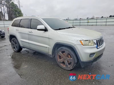 Czwarte zdjęcie samochodu z boku: 2011 JEEP GRAND CHEROKEE LAREDO VIN:1J4RR4GGXBC524047 - miniatura