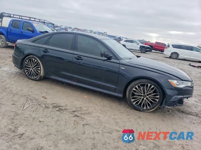 Czwarte zdjęcie samochodu z boku: 2018 AUDI A6 PREMIUM VIN:WAUF8AFC8JN034117 - miniatura