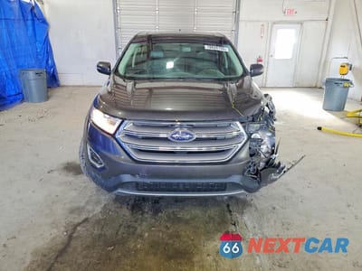Piąte zdjęcie samochodu w środku: 2018 FORD EDGE TITANIUM VIN:2FMPK4K91JBB20607 - miniatura