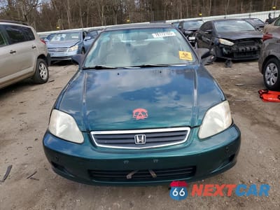 Piąte zdjęcie samochodu w środku: 1999 HONDA CIVIC LX VIN:1HGEJ6579XL020222 - miniatura