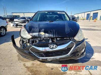 Piąte zdjęcie samochodu w środku: 2011 HYUNDAI TUCSON LIMITED VIN:KM8JU3AC1BU210777 - miniatura