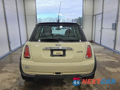 Zdjęcie 6 z 11 samochodu: 2006 MINI COOPER VIN:WMWRC33556TK16227 - miniatura