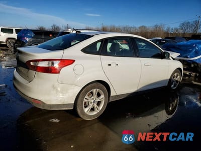 Trzecie zdjęcie samochodu z tyłu: 2012 FORD FOCUS SE VIN:1FAHP3F21CL141368 - miniatura
