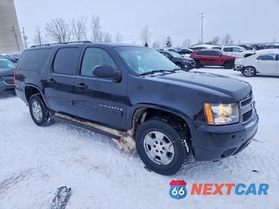 Czwarte zdjęcie samochodu z boku: 2007 CHEVROLET SUBURBAN K1500 VIN:1GNFK16387J251081 - miniatura