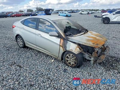 Czwarte zdjęcie samochodu z boku: 2013 HYUNDAI ACCENT GLS VIN:KMHCT4AE1DU315342 - miniatura