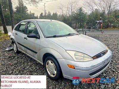 Czwarte zdjęcie samochodu z boku: 2001 FORD FOCUS LX VIN:1FAFP33P71W151227 - miniatura