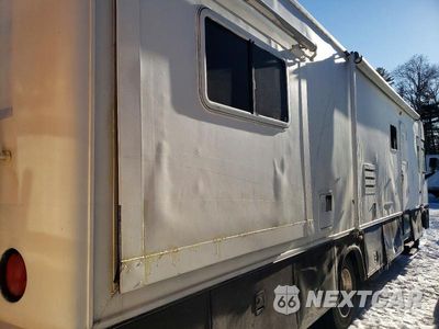 Czwarte zdjęcie samochodu z boku: 2003 FORD F550 SUPER - RV VIN:1FCNF53SX30A05239 - miniatura